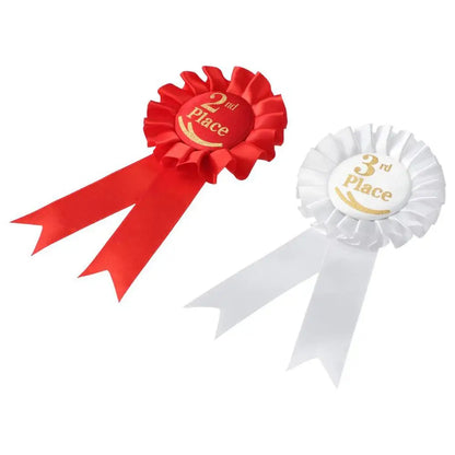 Red second place and white third place rosettes