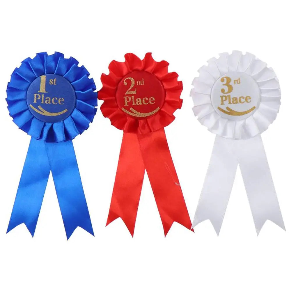 Blue, red and white rosettes for first, second and third place
